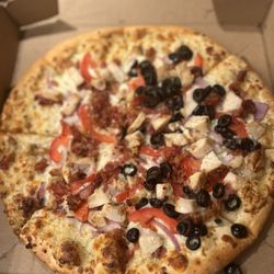 Uncle Joey's Pizza & Grill - Chicken, bacon ranch pizza + olives on one side. toppings like the chicken could've been spread out more but altogether it was tasty.