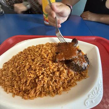 Flavors Nigerian Restaurant - Jollof Rice with beef - African Near Me - Orlando, Florida