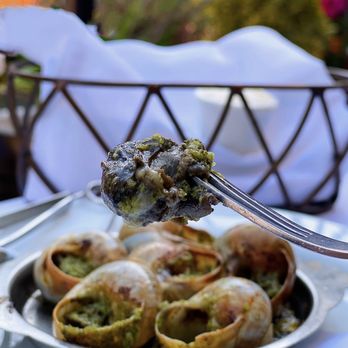 L'Escargot - COVID-19 OUTDOOR DINING: Classic Escargot w/ parsley garlic butter | $18.95 (soak up all the remaining butter w/ the bread!) - French Near Me - Carmel, California L'Escargot - COVID-19 OUTDOOR DINING: Classic Escargot w/ parsley garlic butter | $18.95 (soak up all the remaining butter w/ the bread!) - French Near Me - Carmel, California