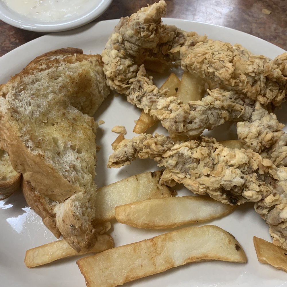 Triple C Steak House - Chicken fried steak fingers with fries. There were more fries but I shared with the hubby. - American Near Me - Devine, Texas Triple C Steak House - Chicken fried steak fingers with fries. There were more fries but I shared with the hubby. - American Near Me - Devine, Texas