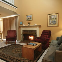 Misty Harbor Resort Motel - Living Room with Fireplace