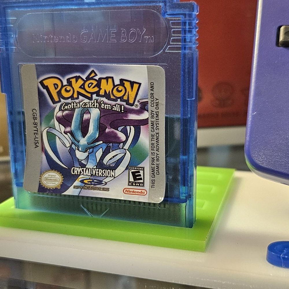 OC Retro Gaming - Bootleg Pokémon Crystal. Note the half-sized circuit board on the inside and the peeling label. - Video Game Stores Near Me - Anaheim, California OC Retro Gaming - Bootleg Pokémon Crystal. Note the half-sized circuit board on the inside and the peeling label. - Video Game Stores Near Me - Anaheim, California