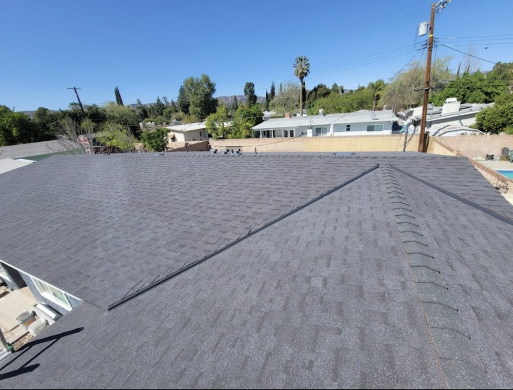 Slide of Grizzly Roofing