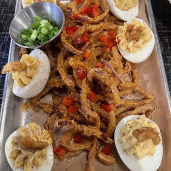 Lucille's Smokehouse Bar-B-Que - Cracked out deviled eggs with crispy onions straws - Barbeque Near Me - Montebello, California Lucille's Smokehouse Bar-B-Que - Cracked out deviled eggs with crispy onions straws - Barbeque Near Me - Montebello, California