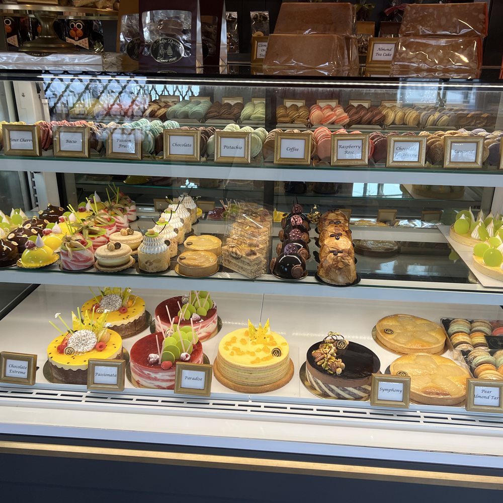 La Tulipe Desserts - I wish the mini cakes on the middle shelf had names/descriptions. - Bakeries Near Me - Mount Kisco, New York