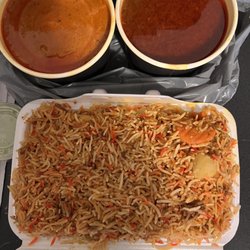 Tandoori Host - Top left butter chicken, top right Chana Masala , bottom vegetable biryani