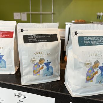 Local Joe - three bags of coffee on a counter - Coffee & Tea Near Me - Ewa Beach, Hawaii Local Joe - three bags of coffee on a counter - Coffee & Tea Near Me - Ewa Beach, Hawaii