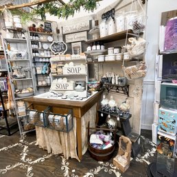 a table with a sign that says soap
