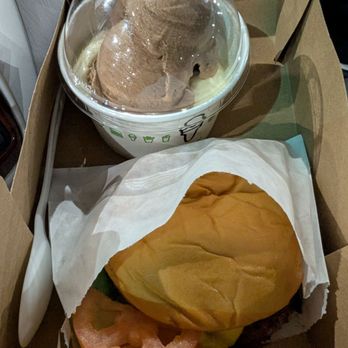 Shake Shack Hillsdale - Frozen custard (vanilla & chocolate) and ShackBurger -  the tomatoes aren't even in the burger and the pickle is up against the cardboard. - Burgers Near Me - San Mateo, California