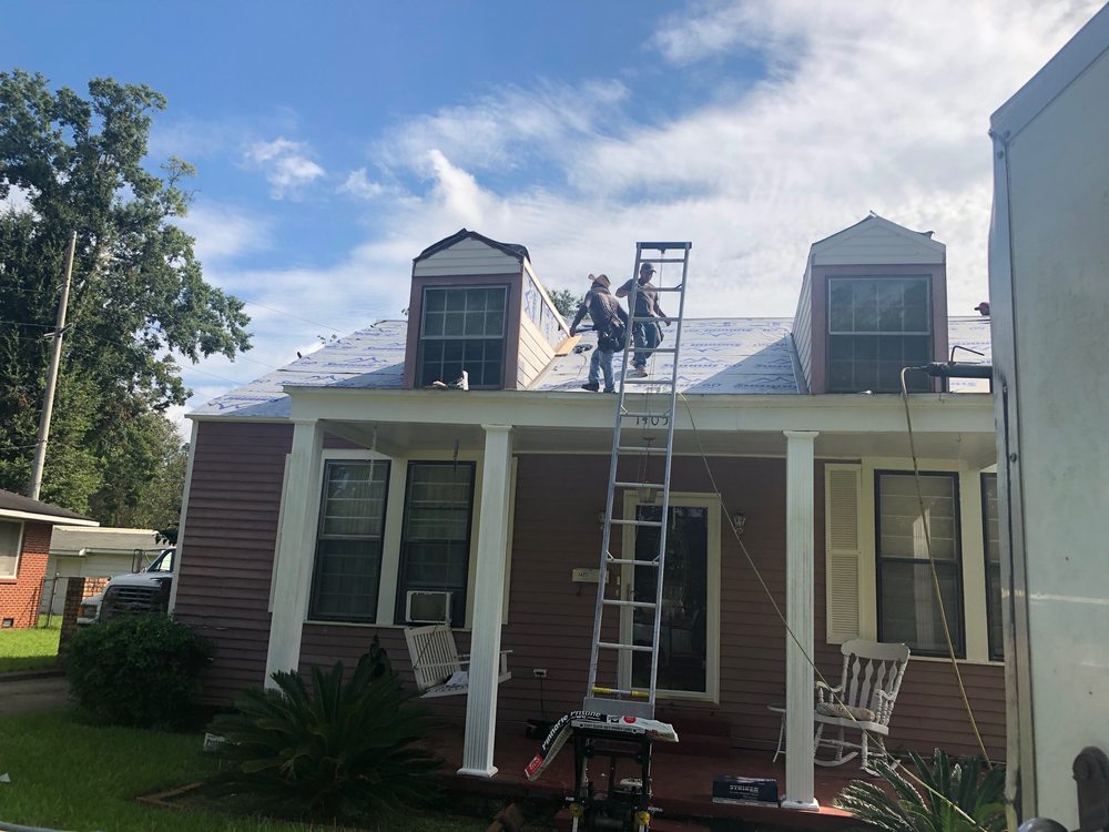 Slide of Carl Fontenot Residential Roofing
