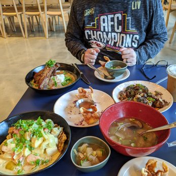 Anousone - Yellow curry with chicken and tofu, Adobo Pork Ribs, Mama's Crab Rangoon, Day Soup, and Fried Brussel Sprouts - Laotian Near Me - Overland Park, Kansas