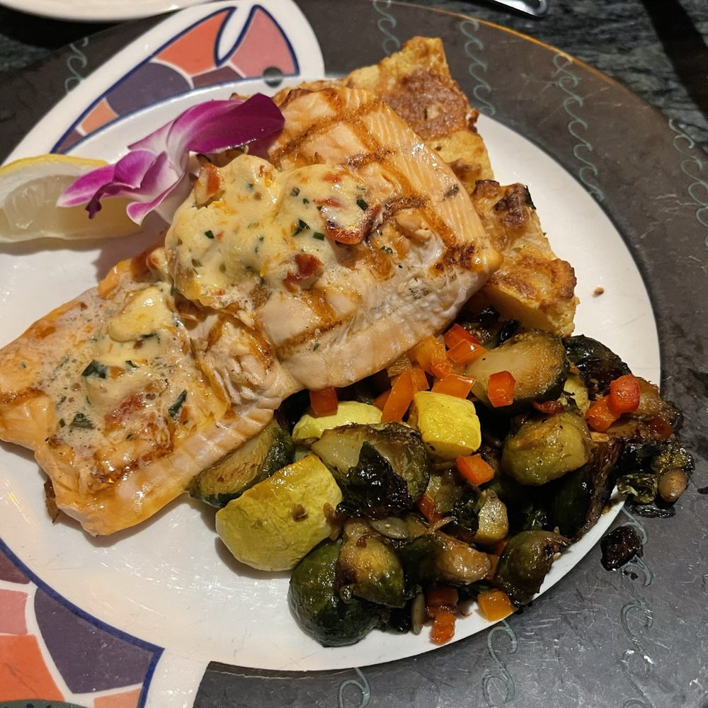 Anthony's Pier 66 - Fresh Wild Alaska King Salmon with cornbread pudding and seasonal vegetables - Seafood Near Me - Seattle, Washington
