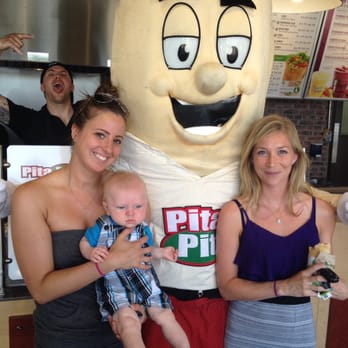 Pita Pit - a woman holding a baby and a man holding a baby - Sandwiches Near Me - Burlington, Ontario Pita Pit - a woman holding a baby and a man holding a baby - Sandwiches Near Me - Burlington, Ontario
