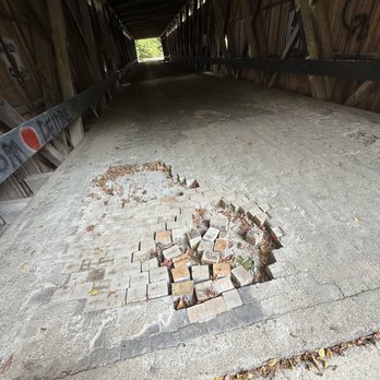 Darlington Covered Bridge - Floor is made of wood block tiles. - Landmarks & Historical Buildings Near Me - Crawfordsville, Indiana Darlington Covered Bridge - Floor is made of wood block tiles. - Landmarks & Historical Buildings Near Me - Crawfordsville, Indiana