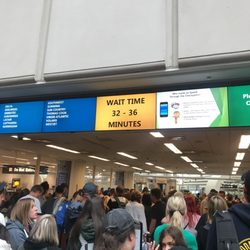 TSA Checkpoint East - Orlando International Airport - Do not believe this. MCO airport sucks. TSA is payed off by Clear! Add at least 1 Hour to this.