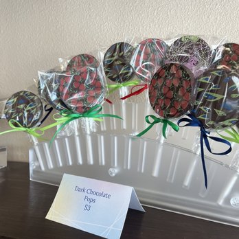 BitterSweet Chocolates - a display of chocolate lollipops - Chocolatiers & Shops Near Me - Olympia, Washington