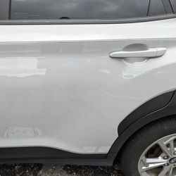 Brick Auto Body - The fixed door panel.