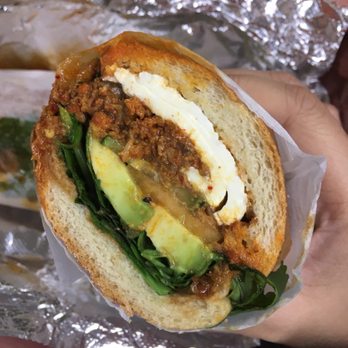 Sunny and Annie's - P.H.O. 10 (pork, sesame leaves, chives, cucumber, avocado, cantaloupe, fresh jalapeño, hoisin sauce, fresh mozzarella, spicy red pesto). - Sandwiches Near Me - New York, New York Sunny and Annie's - P.H.O. 10 (pork, sesame leaves, chives, cucumber, avocado, cantaloupe, fresh jalapeño, hoisin sauce, fresh mozzarella, spicy red pesto). - Sandwiches Near Me - New York, New York