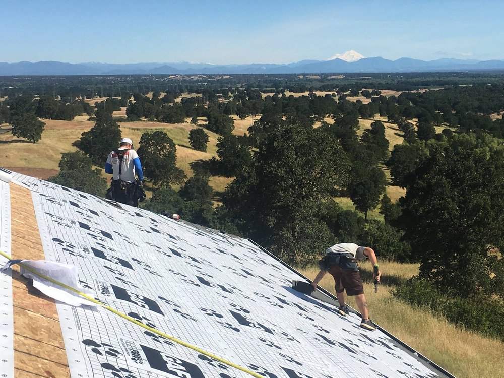 Slide of Tugwell Roofing