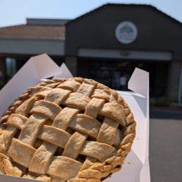 Exterior outside entrance of Yosemite Pie Company - Lattice top in front of the shop - Oakhurst, California Exterior outside entrance of Yosemite Pie Company - Lattice top in front of the shop - Oakhurst, California