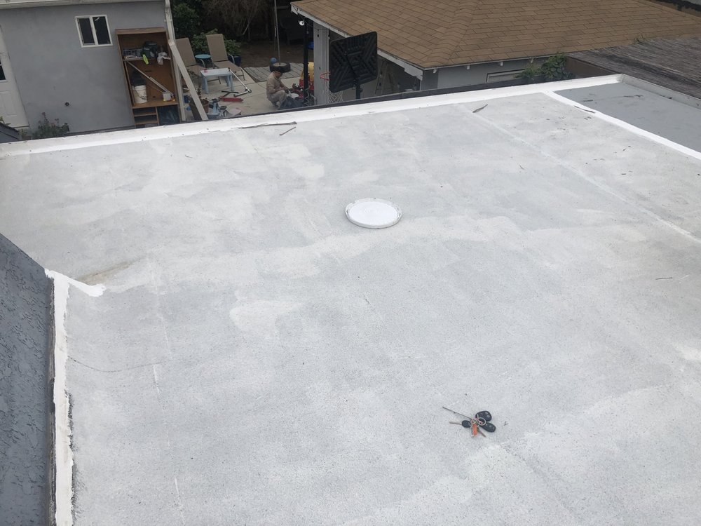 Slide of Huncho Roofer