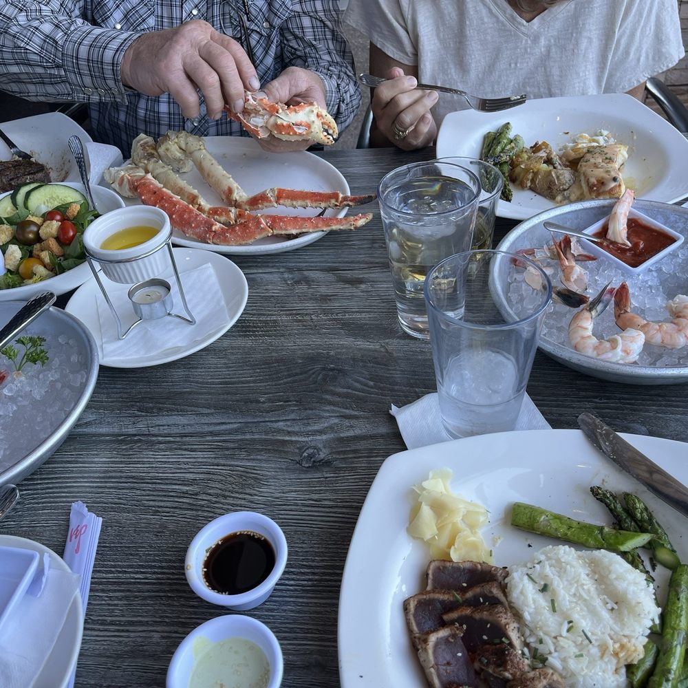 High Tide - Filet mignon and king crab (top left), halibut special (top right), ahi tuna (bottom right) - Seafood Near Me - Gilbert, Arizona High Tide - Filet mignon and king crab (top left), halibut special (top right), ahi tuna (bottom right) - Seafood Near Me - Gilbert, Arizona