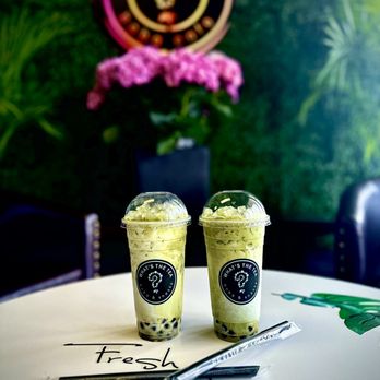 What’s The Tea - two cups of tea on a table - Bubble Tea Near Me - Modesto, California What’s The Tea - two cups of tea on a table - Bubble Tea Near Me - Modesto, California
