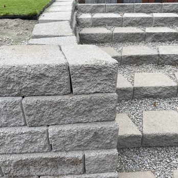 TSADEQ - Did not use correct corner wall blocks. After we had them redo the retaining wall because they had stacked the blocks instead of staggering. - Landscaping Near Me
