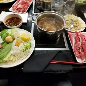 Double 10 Mini Hot Pot - Lamb with super spicy sauces and sides. I did not follow their suggested mixing instructions. - Hot Pot Near Me - Madison, Wisconsin Double 10 Mini Hot Pot - Lamb with super spicy sauces and sides. I did not follow their suggested mixing instructions. - Hot Pot Near Me - Madison, Wisconsin
