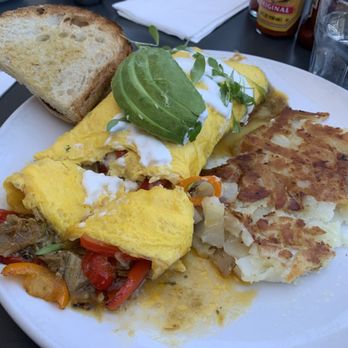 Poached Kitchen - Chili verde omelette...fire - Breakfast & Brunch Near Me - Irvine, California Poached Kitchen - Chili verde omelette...fire - Breakfast & Brunch Near Me - Irvine, California