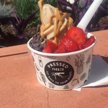 Pressed Juicery - Vanilla freeze with almond butter, strawberries, and carob chips! - Juice Bars & Smoothies Near Me - Santa Barbara, California Pressed Juicery - Vanilla freeze with almond butter, strawberries, and carob chips! - Juice Bars & Smoothies Near Me - Santa Barbara, California