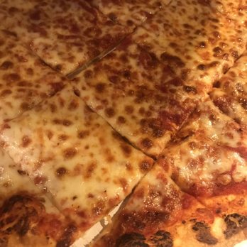 Tubby's Pizza - a cheese pizza cut into slices - Italian Near Me - Galion, Ohio Tubby's Pizza - a cheese pizza cut into slices - Italian Near Me - Galion, Ohio