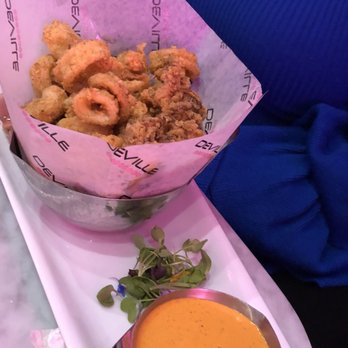 Deville Dinerbar - Calamari with spicy sauce - Diners Near Me - Montreal, Quebec Deville Dinerbar - Calamari with spicy sauce - Diners Near Me - Montreal, Quebec