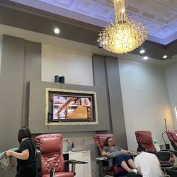 Dallas Nail Bar & Spa - TV screen, lounge chairs spaced comfortably apart