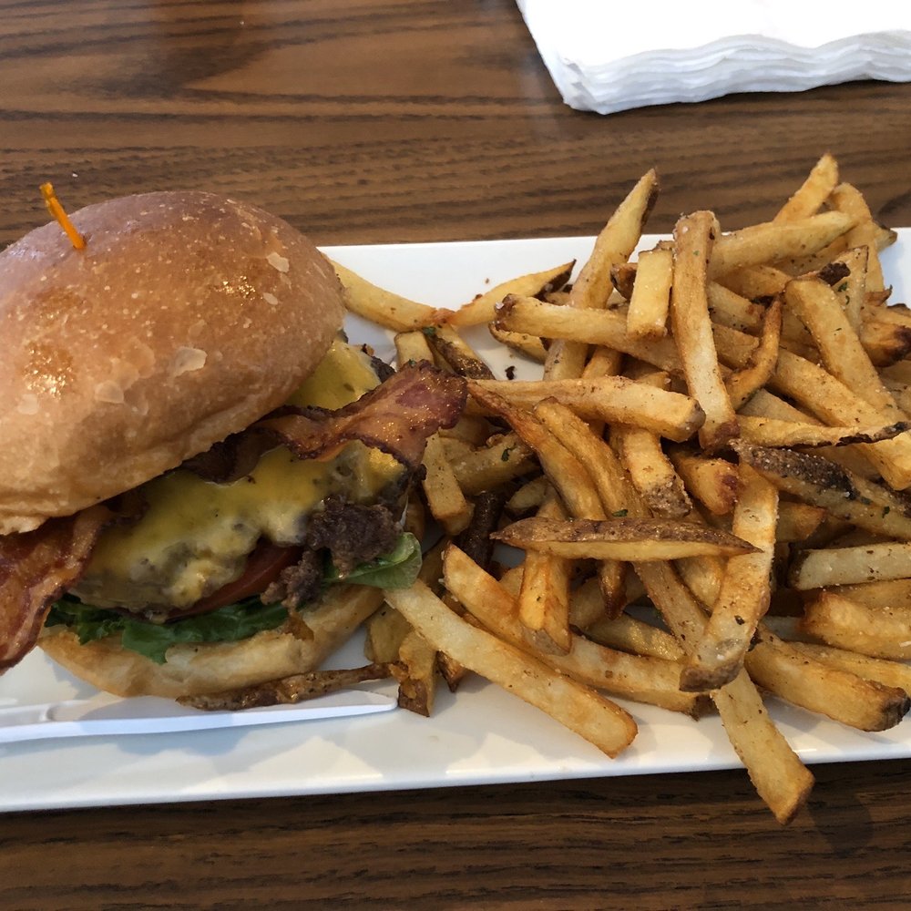 a burger and fries on a plate a burger and fries on a plate