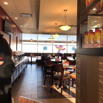 Smitty’s - a woman in a restaurant - American Near Me - Calgary, Alberta Smitty’s - a woman in a restaurant - American Near Me - Calgary, Alberta