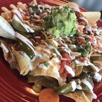 Strap Tank Brewery - Shredded chicken nachos- so loaded we needed more chips! - New American Near Me - Lehi, Utah Strap Tank Brewery - Shredded chicken nachos- so loaded we needed more chips! - New American Near Me - Lehi, Utah