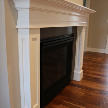 Hughes Home Concepts - a fireplace in the living room - Interior Design Near Me - Sequim, Washington Hughes Home Concepts - a fireplace in the living room - Interior Design Near Me - Sequim, Washington