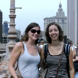 Cititrek Tour & Guide Services - Happy tourists on the Brooklyn Bridge with Municipal Building in foreground