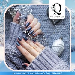 Q Nail Tanning & Skincare - Shine bright like the New Year's sky with starry navy blue and pink snowflake art. A fresh, bold look for 2026. Visit us in Troy!