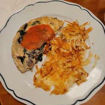 Thirty Acres Kitchen - Country sunrise omelet with mushrooms, spinach and cheese and a side of hash browns - Burgers Near Me - Buena Park, California Thirty Acres Kitchen - Country sunrise omelet with mushrooms, spinach and cheese and a side of hash browns - Burgers Near Me - Buena Park, California