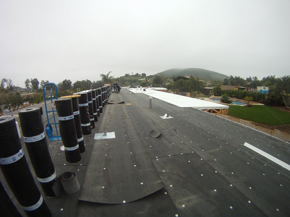 Slide of Urbach Roofing