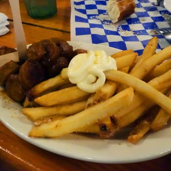 Reichenbach Hall - Curry Wurst (sliced grilled bratwurst tossed in a tomato based curry sauce) - Bars Near Me - New York, New York Reichenbach Hall - Curry Wurst (sliced grilled bratwurst tossed in a tomato based curry sauce) - Bars Near Me - New York, New York
