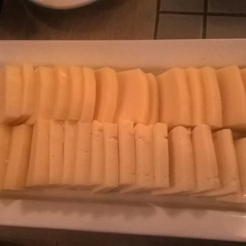 Barawine - Two different Raclette cheeses - Wine Bars Near Me - New York, New York Barawine - Two different Raclette cheeses - Wine Bars Near Me - New York, New York
