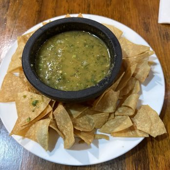 Avocados Mexican Grill - Child and salsa. - Mexican Near Me - Brooklyn, New York