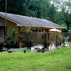 The Cellar Creekside - Outdoor seating with a fire place for those cool nights