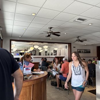 Lighthouse Diner - a group of people sitting at the counter - American Near Me - Jupiter, Florida