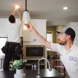 Randy's Electric & Plumbing - Joe and Greg putting the final touches on a kitchen.