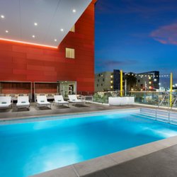Courtyard by Marriott Santa Monica - Relax in our cabanas and lounge chairs in our second floor pool deck terrace, overlooking the Santa Monica Pier and metro station.