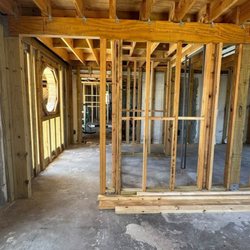 Randolph Remodeling - Interior framing with custom window designed by Shawn Randolph